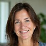 Professional headshot of Sarah Jensen, Veridian Bloom's Lead Health Coach, smiling confidently.