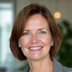 Portrait of Dr. Evelyn Reed, a smiling functional nutritionist