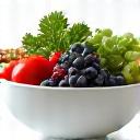 Icon representing balanced nutrition with leafy greens and a precise scale